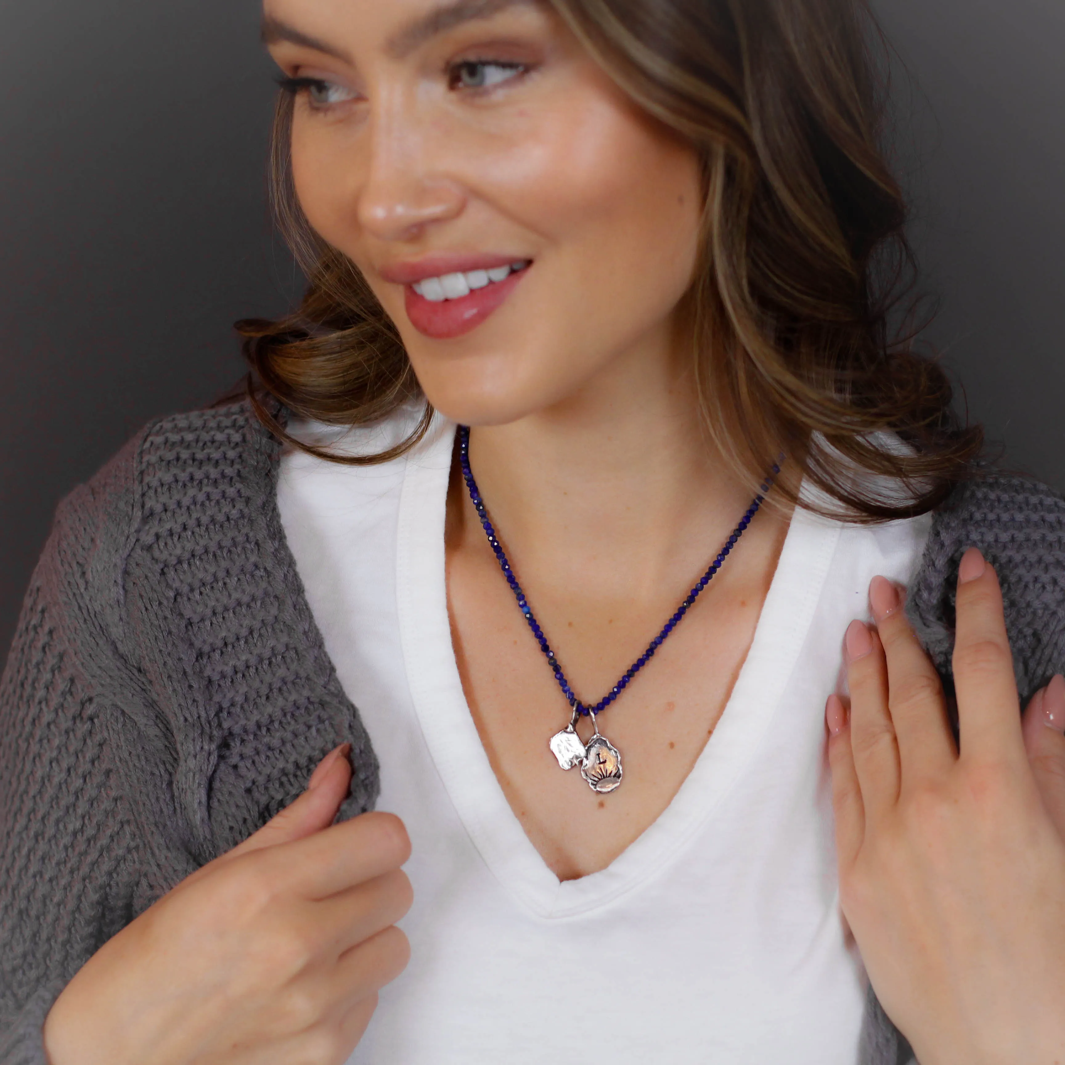 Rise sterling silver initial charm with sun